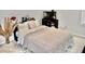 Serene bedroom with a queen-size bed and calming decor at 100 Leveret Rd, Locust Grove, GA 30248