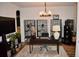 Bright home office with a large desk and ample storage at 100 Leveret Rd, Locust Grove, GA 30248