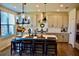 Spacious kitchen with an island, stainless steel appliances, and light cabinets at 100 Leveret Rd, Locust Grove, GA 30248