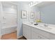 Shared bathroom with double vanity, shower, and tub at 4175 Viola Pl, Atlanta, GA 30349