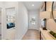 Bright and airy entryway with hardwood floors and views into the living room at 4175 Viola Pl, Atlanta, GA 30349