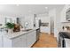 Modern kitchen with white cabinets, granite countertops, and stainless steel appliances at 4175 Viola Pl, Atlanta, GA 30349