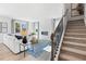 Spacious living room featuring a fireplace and ample natural light at 4175 Viola Pl, Atlanta, GA 30349