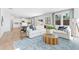 Bright living room with hardwood floors, a sectional sofa, and an open floor plan at 4175 Viola Pl, Atlanta, GA 30349