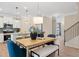 Breakfast nook with a light wood table and blue chairs at 514 Lanier Way, Temple, GA 30179