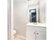 Basement bathroom with white vanity and toilet at 2071 Arrowhead Trl, Marietta, GA 30062