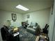 Home office featuring a comfortable chair and ample work space at 4761 Habersham Way, Conyers, GA 30094