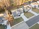 Aerial view of a two-story house with a gray exterior, two-car garage, and a well-maintained lawn at 538 Clinton Dr, Temple, GA 30179