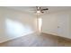 Spacious bedroom with carpeted floors and access to a bathroom at 2870 Aunt Pitty Pat Ln, Douglasville, GA 30135