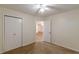 Bedroom with ceiling fan and access to another room at 2870 Aunt Pitty Pat Ln, Douglasville, GA 30135