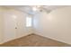 Bright bedroom with carpeted floors and a window at 2870 Aunt Pitty Pat Ln, Douglasville, GA 30135