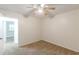 Bright bedroom with ceiling fan and carpet at 2870 Aunt Pitty Pat Ln, Douglasville, GA 30135