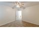 Spacious bedroom with carpet, and bathroom access at 2870 Aunt Pitty Pat Ln, Douglasville, GA 30135