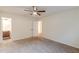 Bright bedroom with carpet, and ensuite bathroom access at 2870 Aunt Pitty Pat Ln, Douglasville, GA 30135