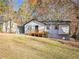 Charming ranch home with wood deck and carport at 2870 Aunt Pitty Pat Ln, Douglasville, GA 30135