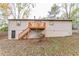 Back of house, featuring deck and stairs at 2870 Aunt Pitty Pat Ln, Douglasville, GA 30135