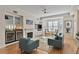 Bright living room with hardwood floors, fireplace, and built-in shelving at 850 Piedmont Ne Ave # 1503, Atlanta, GA 30308