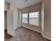 Bright bedroom with two large windows and neutral-colored carpet at 2108 Irvin Ct, Kennesaw, GA 30144