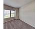 Empty bedroom with plush carpeting and large windows providing ample natural light at 2108 Irvin Ct, Kennesaw, GA 30144