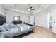 Bright bedroom featuring a large bed and ample closet space at 827 Registry Nw Ter, Kennesaw, GA 30152