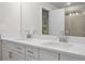 Double vanity bathroom with white cabinets and quartz countertops at 1068 Rose Dr, Marietta, GA 30060