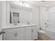 Double vanity bathroom with shower/tub combo at 1068 Rose Dr, Marietta, GA 30060