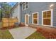 Private patio with concrete slab and wood fence at 1068 Rose Dr, Marietta, GA 30060