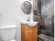 Bathroom with tiled shower, vanity sink, and modern fixtures at 5620 Forest Dr, Acworth, GA 30102