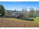 House with large deck, above ground pool, and yard at 201 Nina Cir, Locust Grove, GA 30248