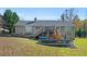 House with large deck, above ground pool, and yard at 201 Nina Cir, Locust Grove, GA 30248
