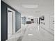 Open concept basement with marble floors and multiple rooms at 201 Nina Cir, Locust Grove, GA 30248