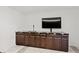 Basement bar with dark wood cabinets and a marble countertop at 201 Nina Cir, Locust Grove, GA 30248