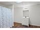Basement bathroom with shower and white vanity at 201 Nina Cir, Locust Grove, GA 30248