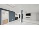 Finished basement with marble flooring, modern wet bar and fireplace at 201 Nina Cir, Locust Grove, GA 30248