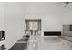 Bright and spacious entryway with marble flooring and built-in shelving at 201 Nina Cir, Locust Grove, GA 30248