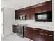 Modern kitchen with stainless steel appliances and white cabinets at 201 Nina Cir, Locust Grove, GA 30248