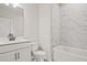 Modern bathroom with marble tile shower and vanity at 3952 Adler Cir, Buford, GA 30519