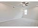 Spacious bedroom with ceiling fan and carpet at 3952 Adler Cir, Buford, GA 30519