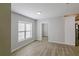 Bright dining room with hardwood floors and large windows at 2330 Beecher Cir, Atlanta, GA 30311