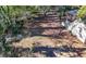 Large lot with mature trees, partially cleared, near other houses at 2905 Waters Sw Rd, Atlanta, GA 30354