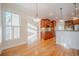 Kitchen with wood cabinets, granite countertops and island at 1713 Wheatstone Dr, Grayson, GA 30017