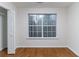 Well-lit bedroom with hardwood floors and a closet at 4970 Newpark Nw Ln, Acworth, GA 30101