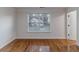 Bright bedroom with hardwood floors and large window at 4970 Newpark Nw Ln, Acworth, GA 30101