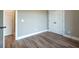 Spacious bedroom with hardwood floors and double door closet at 312 Brook Hollow Ln, Loganville, GA 30052