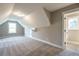 Spacious bonus room with carpet, window, and private bath access at 312 Brook Hollow Ln, Loganville, GA 30052