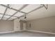 Large garage with high ceilings and extra storage space at 312 Brook Hollow Ln, Loganville, GA 30052