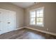Bright office with hardwood floors and double door closet at 312 Brook Hollow Ln, Loganville, GA 30052