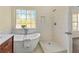 Modern bathroom with soaking tub, walk-in shower, and large window at 482 Chase Marion Way, Mcdonough, GA 30253