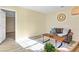 Living room with plush couch, wood coffee table, and view of another room at 482 Chase Marion Way, Mcdonough, GA 30253