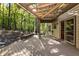 Spacious back deck with pergola overlooking wooded area at 123 Cherry St, Roswell, GA 30075